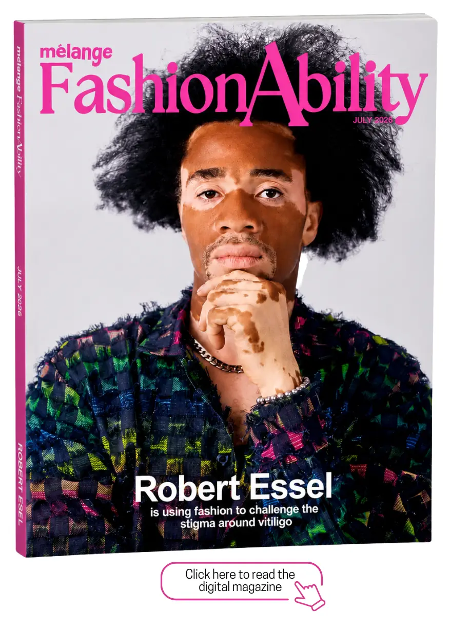 Cover of mélange FashionAbility magazine, July 2026, featuring Robert Essel, a man with a large curly afro and vitiligo, resting his chin on his hand. The headline reads "is using fashion to challenge the stigma around vitiligo."